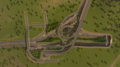 an aerial view of a highway intersection with multiple lanes