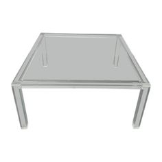 a clear glass table sitting on top of a white floor