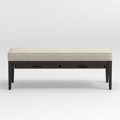 an upholstered bench with two drawers on each side