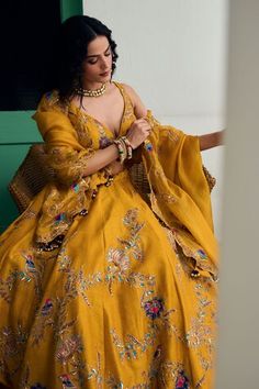 Mustard attached cancan lehenga with zari thread, sequin, cutdana, bead embroidery in diamond, floral pattern. Paired with embroidered padded blouse and dupatta. - Aza Fashions Wedding Sets With Gota Work, Yellow Raw Silk Sets For Wedding, Raw Silk Choli For Wedding, Yellow Raw Silk Wedding Sets, Wedding Lehenga With Gota Work, Wedding Gown With Gota Work, Yellow Chanderi Choli For Wedding, Yellow Wedding Gown With Dori Work, Wedding Yellow Sets With Dori Work