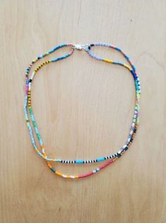 Bead Woven Necklace, Multicolor Single Strand Bead Choker, Handmade Multicolor Double Strand Beads, Multicolor Single Strand Beaded Choker, Multicolor Double Strand Jewelry With Tiny Beads, Adjustable Multicolor Double Strand Beaded Necklaces, Multicolor Tiny Beads Multi-strand Necklace, Multicolor Multi-strand Beaded Necklaces With Tiny Beads, Adjustable Multicolor Double Strand Beaded Bracelets