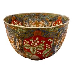 an ornate bowl is shown on a white background