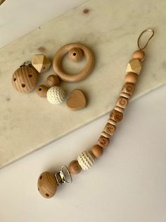 a wooden bead necklace and matching beads