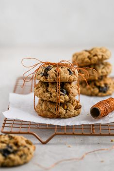 oatmeal raisin cookies wrapped in twine and tied with orange ribbon