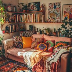 a living room filled with lots of furniture and plants on top of it's shelves