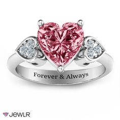 This ring is the perfect fit for any hopeless romantic! The glimmering 9x9 center heart stone will win your heart, and is complimented with two sparkling accent hearts on either side. Choose any birthstone, metal and engraving to complete this one-of-a-kind ring. It makes a truly heart-felt gift for your special someone, or as a treat for yourself! Heart-shaped White Gold Birthstone Ring For Valentine's Day, Heart Shaped Birthstone Ring With Diamond Accents, Anniversary Rings With Diamond Accents And Double Heart, Heart-shaped Diamond Ring With Center Stone, Double Heart Anniversary Rings With Diamond Accents, Valentine's Day Anniversary Double Heart Diamond Ring, Double Heart Diamond Ring For Valentine's Day Anniversary, Pink Three Stone Jewelry For Anniversary, Valentine's Day Birthstone Ring With Diamond Accents