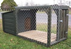 a dog house made out of wood and metal