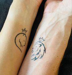 two people holding hands with tattoos on their arms and one has a lion in the middle