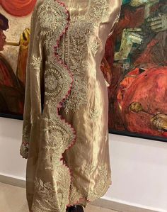 Item Overview ATHARVA Hand Woven Pure Tissue Silk Salwar Kameez/Aari Dori Embroidery/Gold Tissue/Heirloom Worthy/Custom Stitch Unstitch/Wedding/Plazzo/Gift/ Designer Wear Dno. SK2007 Fabric:  * Shirt: Pure Tissue Silk - Hand Embroidery/ 2.5 Mts Beautiful Aari Dori Work * Dupatta: Pure Tissue Silk - Hand Embroidery/ 2.5 Mts Beautiful Aari Dori Work/Elegant/Tassels/ * Bottom: Pure Tissue Silk 2.5 Mts. Excusive Hand Embroidered Party Wear Punjabi Suit. Customization: * Fabrics Customization: Designs Can be made in different Fabrics. *Color Customization: Designs Can be made in different Colors *Stitching Customization: 1. Salwar Kameez  2. Patiala Salwar Kameez  3. Churridar  4. Tunic Pants  5. Anarkali (Extra Charge) 6. Maxie (Extra Charge) 7. Plazzo Pants 8. Embroidered Pants or Salwars 9. Luxury Katan Silk Salwar Kameez With Dori Work, Unstitched Jamawar Suit With Intricate Embroidery For Reception, Jamawar Unstitched Suit With Intricate Embroidery For Reception, Festive Raw Silk Lawn Suit For Reception, Semi-stitched Raw Silk Kurta With Dabka Work, Festive Raw Silk Lawn Suit With Traditional Drape, Unstitched Jamawar Suit With Resham Embroidery For Reception, Traditional Jamawar Wear With Dabka Work For Reception, Gold Lawn Suit With Intricate Embroidery