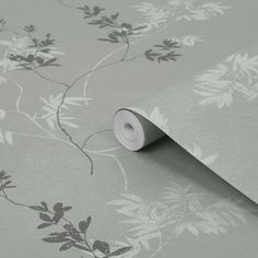 an image of a wallpaper with flowers on the side and a roll of tape