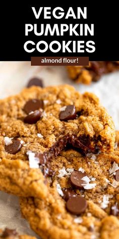 vegan pumpkin cookies stacked on top of each other with chocolate chips and coconut flakes