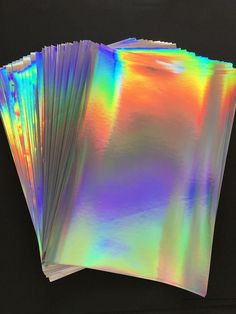 several holographic sheets are stacked on top of each other