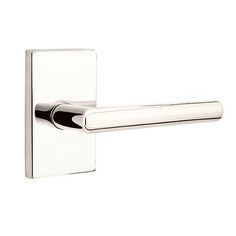 a chrome door handle on a white background