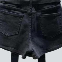 Introducing our 2023 Summer Collection Asymmetric Short Denim Skort. a timeless style masterpiece for the street fashionista! With a mid-waist fit. stonewashed look. and zipper & button closure. this skort is sure to make a statement.Why You'll Love This Skort Street Style: Make a fashion statement on the street with this skort's asymmetrical cut and mid-waist fit. Stonewashed Look: This skort has a classic stonewashed look for a timeless. vintage vibe. Zipper & Button Closure: With a zipper & b Edgy High Waist Jean Shorts With Belt Loops, Casual Black Denim Skirt, Dark Wash High-waisted Streetwear Shorts, Dark Wash High Waist Streetwear Shorts, Dark Wash High Waist Shorts For Streetwear, High-waist Dark Wash Streetwear Shorts, High Waist Dark Wash Shorts For Streetwear, Black Denim Skirt With Belt Loops, Fitted Denim Jean Shorts With Belt Loops