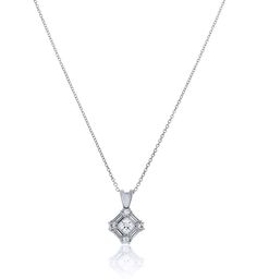 This stunning CZ pendant is diamond framed with Chandi Diamonds. Comes with necklace. 5A Grade Cubic Zirconia Chandi Diamonds Prong Set Rhodium Plated Chandi Diamonds Brilliant Cubic Zirconia Stones (CZ's) sourced by Bobby Schandra and featuring the highest grade CZ’s in the world. Chandi Diamonds are known for their brilliance and represent the top 5% of CZ’s available on the market today. Just like real diamonds, CZ’s have a number of Quality Levels based on cut, clarity, color and carat. Chan Square Pendant Necklace With Prong Setting For Wedding, Formal Diamond White Pendant Diamond Necklace, Formal Diamond White Pendant Necklace, Diamond White Pendant Diamond Necklace, Diamond Cut White Diamond Pendant Necklace, Diamond White Pendant Necklace With Diamond Cut, Exquisite Diamond White Diamond Necklace Pendant, Exquisite Diamond White Pendant Necklace, Elegant Diamond Necklace With Square Pendant Accents