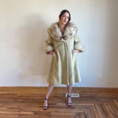 "This is a stunning princess coat from the 1960s. It features a cream mohair with arctic fox fur at the collar and wrists. It has one snap closure. \"Lilli Ann Paris San Fransisco\" label tag Fits up to XL Bust up to 44\" Sleeve 25\" Length 45\" Mohair and fox fur Good as is condition, see photos for some stains on the inside" Vintage Cream Fur Coat With Faux Fur Trim, Elegant Cream Fur Coat With Faux Fur Trim, Cream Fitted Fur Coat With Faux Fur Trim, Fitted Cream Fur Coat With Faux Fur Trim, Elegant Cream Faux Fur Coat, Vintage Winter Wedding Outerwear, Elegant Long Cream Fur Coat, Winter Mantels, Lilli Ann