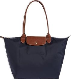 Classic Nylon Shoulder Bag For Shopping, Elegant Nylon Bag With Leather Trim, Classic Nylon Shopping Bags, Navy Shoulder Bag With Leather Trim For Travel, Navy Travel Shoulder Bag With Leather Trim, Classic Everyday Waterproof Bags, Classic Waterproof Everyday Bags, Elegant Travel Bags With Lined Interior, Elegant Travel Bag With Lined Interior