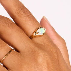 A ring that shimmers with possibility, a close companion. Expertly set in 14k gold with an especially opalescent opal.

In honor of our collaboration with Jenny Slate, the Catbird Giving Fund is proud to make a donation of $20,000 to Planned Parenthood, in support of their steadfast commitment to reproductive rights.

Jenny Slate x Catbird is a tender ode to baubles and braids from childhood, the passage of time, rings to wear after a heartbreak, bells for beloveds and buttons of admiration. A tiny bit of magic. Jenny Slate, Beachy Jewelry, Reproductive Rights, Planned Parenthood, Oval Cabochon, Signet Ring, Gold Bands, Style Guides, Opal