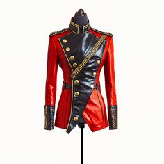 This jacket features a striking design inspired by military and hussar aesthetics. It combines vibrant red and sleek black leather, creating a bold contrast. The front is asymmetrical with a black leather panel adorned with large, decorative gold buttons. Gold braided detailing runs diagonally across the chest, adding a touch of regality. Structured epaulettes and a high stand-up collar, both trimmed with gold, enhance the jacket's commanding look. The cuffs also feature black leather with gold Fitted Leather Biker Jacket For Cosplay, Fitted Leather Biker Jacket For Alternative Fashion, Fitted Leather Jacket For Stylish Wear, Red Fitted Outerwear For Alternative Fashion, Fitted Red Outerwear For Alternative Fashion, Edgy Fitted Leather Jacket For Cosplay, Fitted Punk Leather Jacket For Cosplay, Red Fitted Punk Outerwear, Red Leather Punk Outerwear