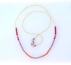 Melon mix seed bead necklace www.sonyaooten.com Adjustable Orange Beaded Necklaces With Tiny Beads, Adjustable Orange Beaded Necklace With Tiny Beads, Adjustable Orange Single Strand Beaded Necklace, Adjustable Orange Beaded Necklace With Faceted Beads, Orange Tiny Beads Necklace For Gift, Orange Necklaces With Tiny Beads For Gift, Adjustable Orange Beaded Necklace, Orange Necklaces With Gold Beads For Gifts, Orange Necklace With Gold Beads For Gifts