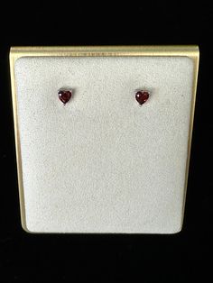 Embrace love and passion with our Heart Shape Garnet Earrings. Crafted in 925 Sterling Silver, each earring features a romantic heart-shaped garnet gemstone, symbolizing devotion and vitality. Perfect for expressing your affection or adding a touch of elegance to any outfit, these earrings are a timeless addition to your collection. Wear your heart on your ears - order now and let your love shine. ✨Why Choose Us: This crystal is unique and one-of-a-kind as it is carefully sourced, handpicked, and handled with the utmost care to ensure its beauty is preserved.  ✨Note: If anything happens to the crystal we are not responsible, as we make sure it is packed with care due to its delicate nature. Heart-shaped Gemstone Earrings For Anniversary, Heart Shaped Gemstone Earrings For Anniversary, Anniversary Heart-shaped Gemstone Earrings, Classic Heart Cut Earrings For Valentine's Day, Classic Heart-shaped Earrings For Valentine's Day, Valentine's Day Heart Gemstone Earrings, Classic Valentine's Day Heart Cut Earrings, Valentine's Day Formal Heart Gemstone Earrings, Formal Heart-shaped Birthstone Earrings