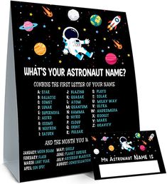 an astronaut name sign with space theme on it and a place card for the child's name