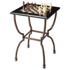 a table with chess pieces on it and one piece missing from the game, sitting in front of a white background