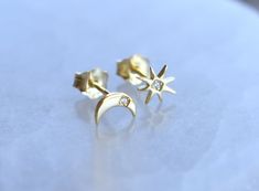 Gold Moon & Star Studs:-18k Gold over .925 sterling silver-Moon measures 8mm x 4mm, Star is 6mm x 6mm, with 1.5mm diamond pave crystals.-Sold as a pair with butterfly backings. Connect with us on Instagram @a_wild_violet for sales and giveaways!**All items are in stock and ship within 2-5 business days from received payment (excluding Saturday/Sunday) from the US. If you are within the US please expect 3-7 business days for shipping transit and delivery. International orders please expect a minimum of 2 weeks for delivery and upwards of 2-6 weeks for transit and delivery during the holiday season. Shipping upgrades are available during checkout. All designs and content copyright © 2009-2023 A Wild Violet. All rights reserved. Celestial Earrings With Diamond Accents For Anniversary, Celestial Diamond Earrings As Gift, Gold Celestial Earrings With Diamond Accents, Celestial Gold Earrings With Diamond Accents, Star Earrings Stud, Gold Moon, Silver Moon, Moon Star, Star Studs