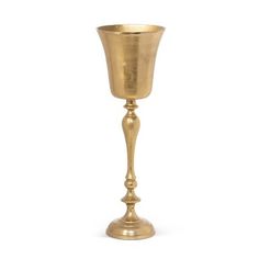 a gold colored candle holder on a white background