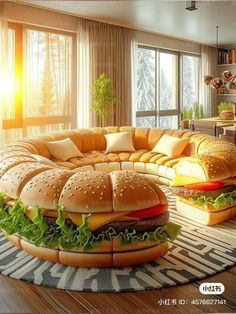 a living room filled with furniture and giant hamburgers