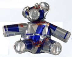 a silver and blue teddy bear with cans on it's back, in the shape of a soda can