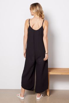 Looking chic is effortless with this Z Supply jumpsuit. Crafted in breezy gauze fabric with a flowy, relaxed fit, this versatile jumpsuit features side pockets, adjustable straps, and angled hems. Add a sun hat and slides for the perfect summer look. | Z SUPPLY Women's Flared Gauze Jumpsuit, Size XL, Black Casual Black Jumpsuits And Rompers With Adjustable Straps, Casual Jumpsuits And Rompers With Adjustable Straps For Vacation, Chic Jumpsuits And Rompers With Adjustable Straps For Vacation, Casual Vacation Jumpsuits And Rompers With Adjustable Straps, Beach Jumpsuits And Rompers With Adjustable Straps, Solid Color Jumpsuits And Rompers For Summer Lounging, Solid Color Summer Beachwear Jumpsuits And Rompers, Solid Jumpsuits And Rompers For Summer Lounging, Solid Color Beachwear Jumpsuits And Rompers For Summer