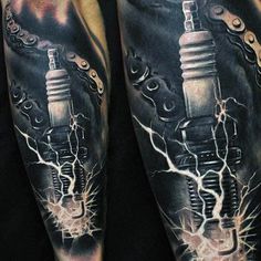 a man's leg with an electric shock tattoo on it