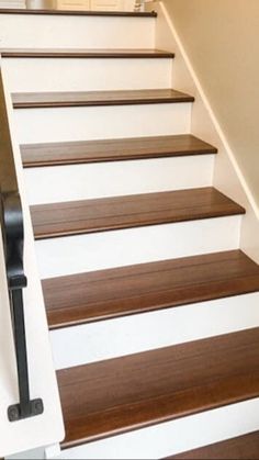 the stairs are painted white and brown