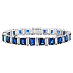 Platinum Asprey & Co 23 Carat Sapphire and Diamond Bracelet to His Majesty Qaboos Bin Said Diamonds: Baguette cut diamonds together approx. 9.6 ct. diamonds Sapphires: Octagonal shape Intense & Royal Blue Siam Sapphires together 23.5 ct. Comes with a Carat Gem Lab certificate (Report number CGL28030) Material: Platinum Measurements: Will fit a 18cm wrist, 180 mm x 7.2 mm ( can be adjusted on request) Total weight: 50.7 gram / 1.790 oz / 32.6 dwt Qaboos Bin Said, Bracelet Tennis, Antique Bracelets, Baguette Cut Diamond, Baguette Cut, Vintage Bracelets, Sapphire Diamond, Tennis Bracelet, Jewelry Gift Box