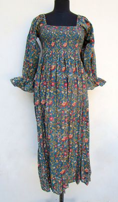 "ITEM DESCRIPTION night blues printed cotton long maxi dress - square neckline with smocked maxi dress - long sleeve boho maxi dress Features: Long sleeve, square neck, Long dress Material: Cotton cambric Fabric: 100% cotton soft light weight ethnic print fabrics  Sleeve Length = 22 inch For more sizes & their measurement, please refer our below chart to understand the sizes variations available with us For your size requirement, please mention your size in seller note at the time of buying. SIZE MEASUREMENT  BUSTLENGTHSHOULDER XXS34 inch51 inch13.5 inch XS36 inch51 inch14 inch S38 inch51 inch14.5 inch M40 inch51 inch15 inch L42 inch51 inch16 inch XL44 inch51 inch16.5 inch 2XL46 inch51 inch17 inch 3XL48 inch51 inch18 inch   Company Return Policy:  Please write for more information to my em Bohemian Flowy Maxi Dress With Smocked Cuffs, Flowy Bohemian Maxi Dress With Smocked Cuffs, Bohemian Square Neck Maxi Dress For Fall, Bohemian Maxi Dress With Square Neck For Fall, Fall Bohemian Maxi Dress With Square Neck, Bohemian Fitted Maxi Dress With Smocked Cuffs, Bohemian Dresses With Smocked Cuffs, Bohemian Cotton Dress With Smocked Cuffs, Blue Bohemian Square Neck Maxi Dress