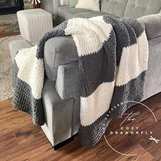 a couch with a blanket on top of it