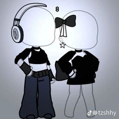 two people with headphones are standing next to each other