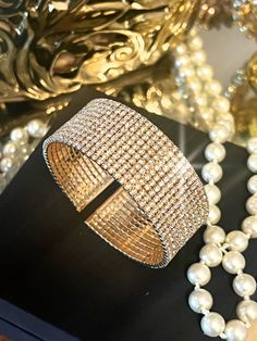 BELLA-TIARA'S BRIDAL ROYAL JEWELRY COLLECTION A BELLA-TIARA'S FAVORITE Gorgeous, elegant and glamorous wide Swarovski crystal gold cuff bracelet. Design with crystal all around the perfect fit approx 2." wide and 7" round suitable for average wrist. *Note processing time is not shipping time, our regular Free shipping takes approx. 5-6 days to receive after shipped. With rush processing your order is expedited and you will also be upgraded to priority mail approx 2-3 days to arrive once shippedE Swarovski Tiara, Crystal Purse, Wedding Necklace Set, Wedding Hair Headband, Crystal Cuff Bracelet, Gold Cuff Bracelet, Gold Bracelet Cuff, Bracelet Design, Gold Cuffs