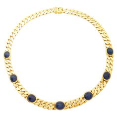 Cabochon Blue Sapphire 33.57 carats Necklace set in 18K Gold Settings Width: 1.1 cm Length: 43 cm Total Weight: 95.29 grams "We first opened doors in 1980 when it was then situated in the vicinity of the Victory Monument; a small and modest storefront with a couple of counters. From its humble beginnings to where it stands today, our company has proven its abilities as a jeweler. Since the beginning, we have been supplying fine quality pieces to dealers, wholesalers and customers worldwide. From Formal Round Cabochons With Bezel Setting, Formal Gold Chain Necklace With Gemstone, Formal Yellow Gold Round Cabochons, Formal Gold Necklace With Round Stone, Formal Yellow Gold Cabochon Jewelry, Luxury Cabochon Round Stone Jewelry, Luxury Gold Gemstone Cabochons, Luxury Round Cabochon Jewelry, Luxury Round Chain Necklace For Formal Occasions