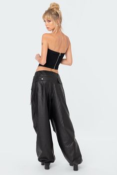 Parachute pants Faux Leather Oversized fit Pockets Drawstring finishings Faux Leather Model wears size XS/S Model height is 5'6 Item care: Hand wash Leather Cargo Pants, Leather Pants Outfit, Oversized Pants, Low Rise Pants, Swimwear Dress, Faux Leather Pants, S Models, Model Height, Oversized Fits