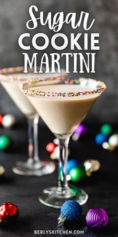 two martinis with sugar and sprinkles on the rim, next to candy balls