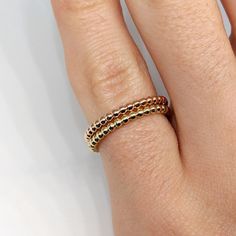 Everyone in our office wears one of these ball bands every. single. day. It's a classic and an absolute favorite. It's sure to compliment any combination of rings, from dainty to ka-pow! This setting is currently priced with solid 14k gold Stackable 14k Rose Gold Eternity Band, 14k Rose Gold Stackable Eternity Band, Elegant Rose Gold Stackable Rings, Rose Gold Stackable Rings Tarnish Resistant, Elegant Hypoallergenic Stackable Rings, Elegant Stackable 14k Gold Hypoallergenic Rings, Fine Jewelry Rose Gold Bands In 14k, Fine Jewelry 14k Rose Gold Bands, Elegant 14k Gold Hypoallergenic Stackable Rings