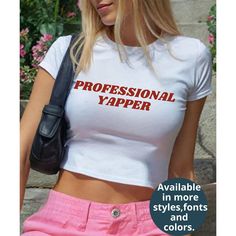 Discover the Professional Yapper T-shirt and Women's Baby T-shirt in our collection. Embrace the Y2K Baby T-shirt and join the Funny Meme Trend. Perfect as a gift for her, these tees are as seen on TikTok. Enjoy comfortable colors and unique styles. About Our Product: ⭐ Explore our versatile collection of 90s-style baby tee shirts, available in three unique styles, perfect for adults who love the retro fit. Each type offers distinctive features that ensure comfort, durability, and style. ⭐ Commo Funny White Short Sleeve Top, White Y2k T-shirt With Funny Text, Y2k White T-shirt With Funny Text, Funny White Tops With Name Print, Trendy White T-shirt With Name Print, Funny White T-shirt With Name Print, Professional Yapper, Baby Tee Shirts, Summer Fits