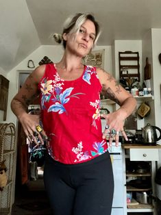 This is perfect and barely worn  1980's Avon brand cherry red tank top with hawaiian floral print  Boxier fit to tank  Thicker straps  Scoops fairly low in the back  Cotton material  Seems barely worn in perfect condition  So vibrant and colorful  Tag is in near perfect condition  Fits a womens medium  Measurements are approximate and taken flat so please double bust and waist for more accurate sizing  Bust: 18 in  Waist: 18 in  Length: 21.5 in  All sales are final  Thanks for checking out Cerea Hawaiian Floral Print, Red Tank Top, Red Tank, Red Tank Tops, Vintage Avon, Cotton Tank Top, 1980s Vintage, Womens Tank, Cotton Material