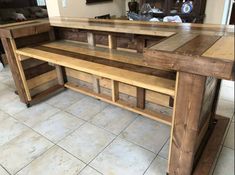 a kitchen island made out of wooden planks