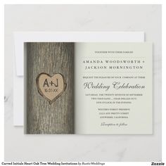 a wedding card with a heart carved into the bark of a tree, on top of a