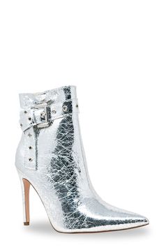 Gleaming grommets add street-savvy edge to this sleek pointed-toe bootie lofted by a sky-high stiletto heel. 4" heel 6" shaft; 9 1/2" calf circumference Synthetic upper, lining and sole Imported Sky High, Stiletto Heel, Boot Shoes Women, Mid Calf, Bootie, Nordstrom Rack, Knee High, Stiletto Heels, Bootie Boots