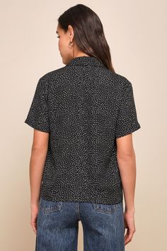 It's easy to dress for success when you have the Lulus Good Luck Charm Black Polka Dot Short Sleeve Button-Up Top in your closet! This classic collared top has a full button and loop placket running the length of its breezy, woven fabric bodice. This sweet little top keeps the charm going with its boxy silhouette and front patch pocket, perfect for transitioning between casual cool and office chic! Fit: This garment fits true to size. Length: Size medium measures 24" from top to bottom. Bust: Great for any cup size. Waist: Not Fitted - comfortable room throughout midsection. Undergarments: May be worn with any standard bra. Fabric: Fabric has no stretch. Unlined and slightly sheer. 100% Polyester. Hand Wash Cold. Do Not Bleach. Line Dry. Iron Low Heat. Imported. Lulus | Good Luck Charm Bla Black Top With Button Closure And Collared Neckline, Black Collared Top With Button Closure, Polka Dot Blouse With Button Closure For Workwear, Polka Dot Button-up Blouse For Work, Polka Dot Collared Blouse With Button Closure, Polka Dot Tops With Button Closure For Workwear, Black Tops With Collared Neckline And Buttons, Black Tops With Buttons And Collared Neckline, Black Tops With Buttoned Collared Neckline