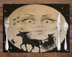 a plate with a drawing of a man riding a horse drawn carriage in front of a full moon